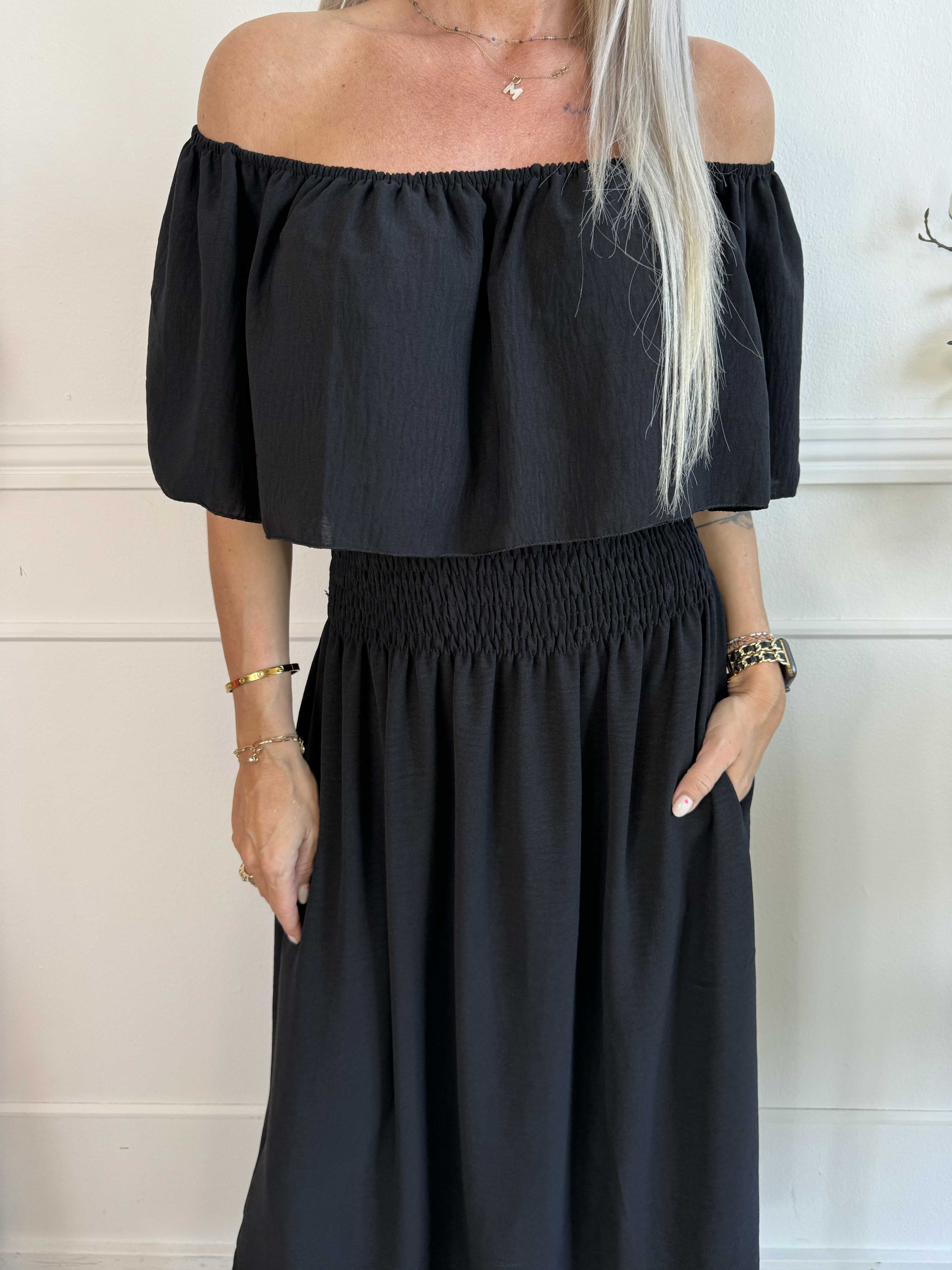 Rachel - Lång klänning med fickor och volang i nederkanten